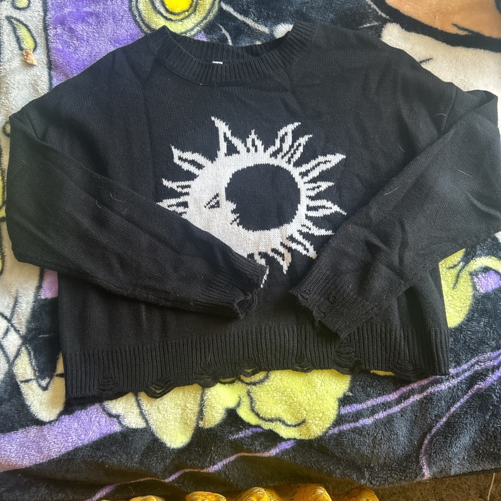 No Boundaries Black Sweater with White Sun Design